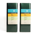 Two green tins of Ottaviani extra virgin olive oil with colourful labels